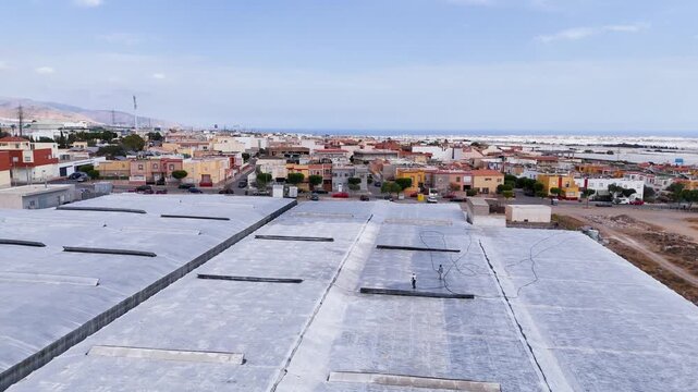 industrial cover town border city limit modern equipment agriculture roof plastic sea urban texture drone industry business sucess travel - Andalusia, Spain - 2025
