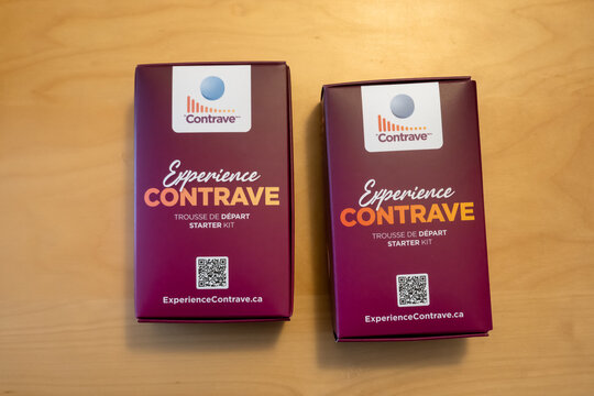 Calgary, AB, Canada. April 15, 2026. Two Contrave weight loss medication starter kits on a table, showing branded pharmaceutical packaging.