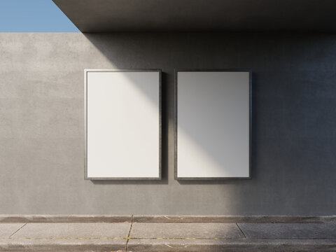 3D Render Industrial Style Double Vertical Poster Mockup on Concrete Wall. Urban Street Style Two Blank Poster Frames Mockup with Dramatic Sunlight Shadow
