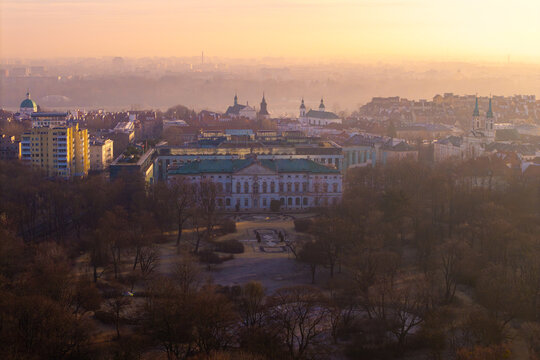 Aerial view of the historic Krasinski Palace and surrounding park during a hazy sunrise in Warsaw, Masovian Voivodeship, Poland.