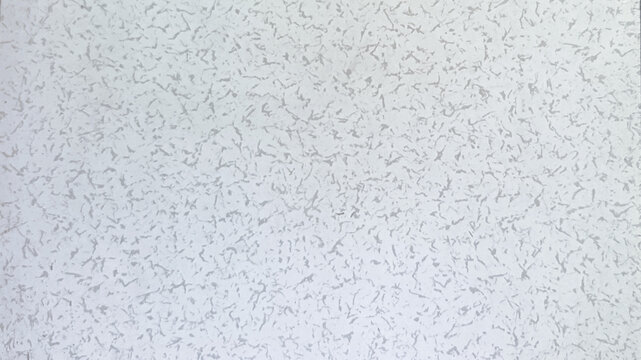 Subtle white textured ceiling panel surface, ideal for modern interior design and sound absorption, featuring a granular finish that adds depth to commercial and residential spaces