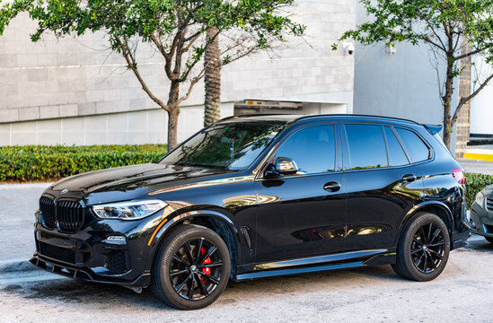 Miami, Florida, USA - July 27, 2025: BMW X5 G05 2019 SUV car. Luxury SUV car BMW X5 G05. Car BMW X5 G05 SUV parked outdoor. Black SUV car, side view