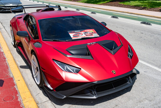 Miami, Florida, USA - July 27, 2025: Luxury Lamborghini Huracan EVO Spyder. Car Lamborghini parked outdoor. Red car, corner view. Lamborghini Huracan EVO Spyder 2020 car
