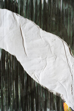 Dark Green Distorted Texture Over Torn White Paper Background