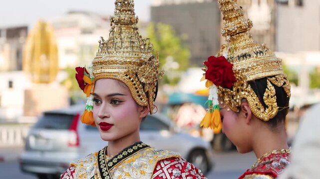 Thai Khon Dancers in Traditional Costumes Standing Outdoors in Bangkok