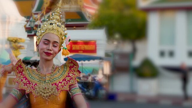 Traditional Thai Khon Dancer in Ornate Costume at Bangkok Temple