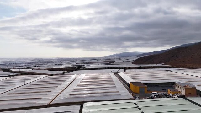 industry plastic sea greenhouse field industrial roof building architecture infinite earth terra collapse abstract modern equipment forming grey shape invernaderos - Andalusia, Spain - 2025