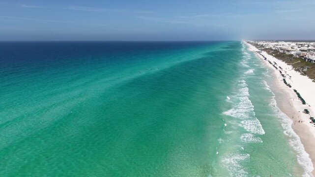 Panoramic aerial fly over white sandy Rosemary Beach with crystal clear Gulf, Panama City Beach, Florida, USA