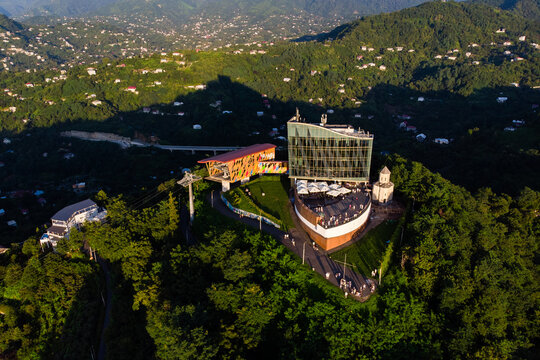 Aerial view of Argo Cable Car station and entertainment center on Anuria Mountain in Batumi. Modern architecture, tourism destination, mountain landscape and travel in Georgia concepts, vacation