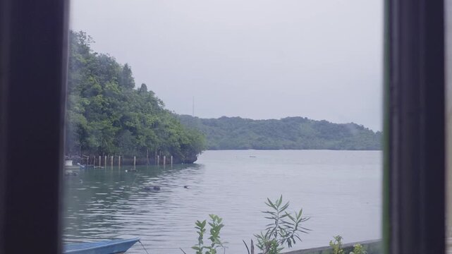 Coastal landscape view framed by window in Southeast Maluku Indonesia