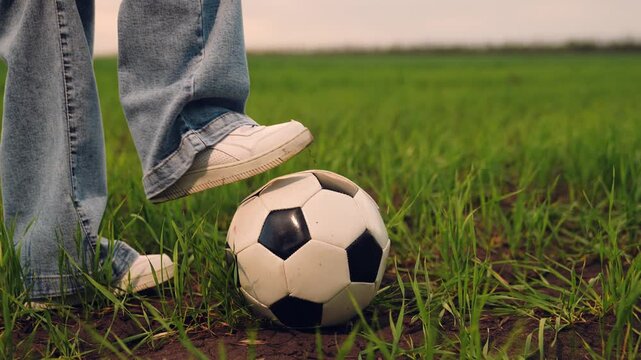 child kid baby girl run across green lawn sunset, kicking soccer ball, playing football field, childhood dream happy kid, youth football kicking, field sports equipment, soccer ball closeup, amateur
