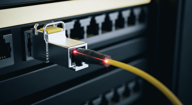 High-speed fiber optic cable connected to a network server switch with glowing red light representing data transmission