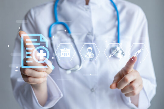 Health professional using technology to access medical information and manage patient care in a clinical setting