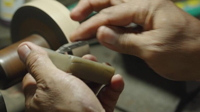 Manual sharpening of nipper tool using sharpening stone