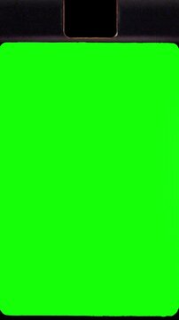 Vintage 35mm film strip scrolling with green screen frames