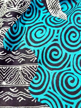 Abstract Batik Pattern with Blue Spirals and Tribal Ornaments