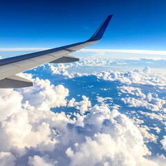 Obraz premium Aerial view of airplane wing soaring through cloudy skies