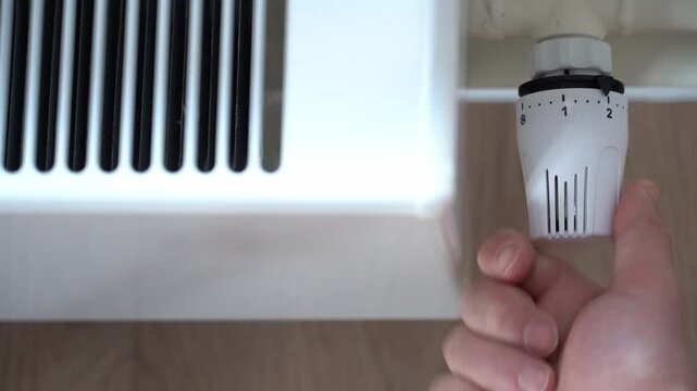 Radiator temperature adjustment. Adjusting the radiator to increase or decrease the room temperature. High quality FullHD footage