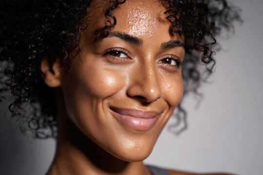 closeup portrait of joyful woman after run her flushed cheeks glowing with happiness