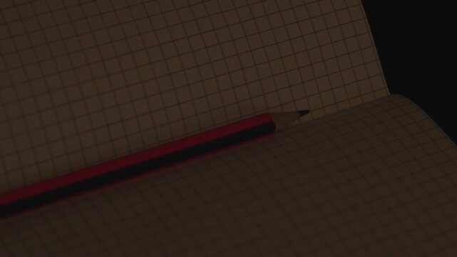 Close Up of Red Pencil on Gridded Notebook in Dim Lighting