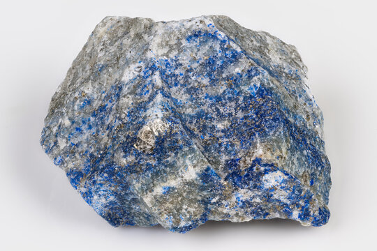 Gemstone with veins. Raw lapis lazuli showing veins. Unrefined lapis with cobalt veins and calcite. Lapis lazuli raw specimen revealing cobalt veins and pyrite flecks