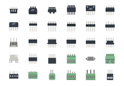 A collection of various electronic connectors and microchips arranged on a white surface for inspection.