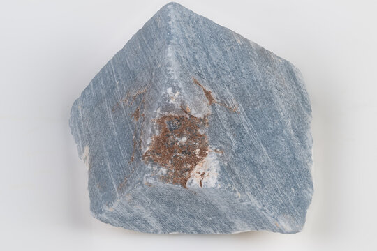 Decorative mineral slab with natural veins and rust coloration. Angelite mineral piece featuring intricate veins and earthy rust accents for metaphysical purposes