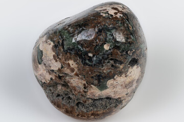 Fototapeta premium Leopard Jasper Detail. Detailed Photography of Polished Leopard Jasper Stone Surface. HighResolution Image Showcasing Gleaming Leopard Jasper with Natural Matrix Patterns