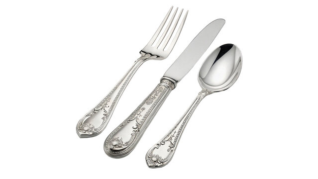 Set of silver cutlery with fork, knife, and spoon isolated on transparent background cut out
