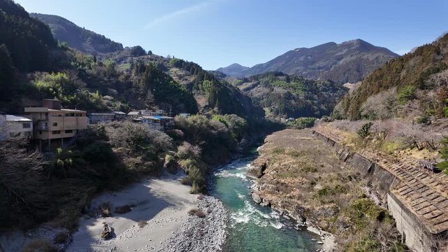 Oboke gorge, Japan: Panoramic footage of the Oboke gorge and the Yoshino river in the mountain of the Shikoku island in Japan on a sunny spring day.