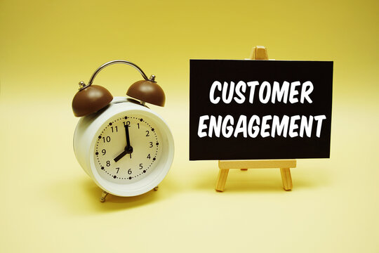 Customer Engagement text message and alarm clock on yellow background