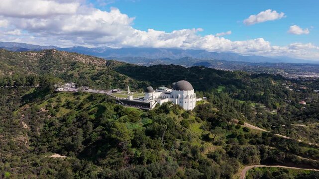 Griffith Observatory aerial drone wide panorama over Los Angeles hills and city skyline, February 20, 2026