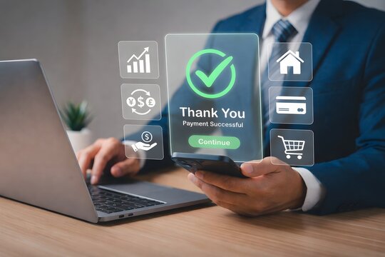 Mobile payment success concept with businessman using smartphone and laptop