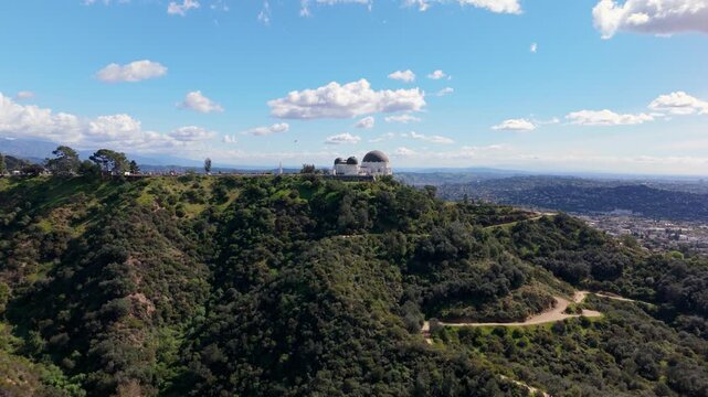 Griffith Observatory aerial drone shot moving left to right over Hollywood Hills, February 20, 2026