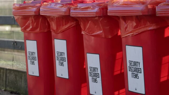 Garbage cans for forbidden dangerous items at the event, security discarded trash