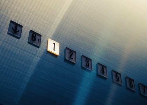 First Floor Lit Elevator button sIgn number Lift interior Modern building Conceptual photo