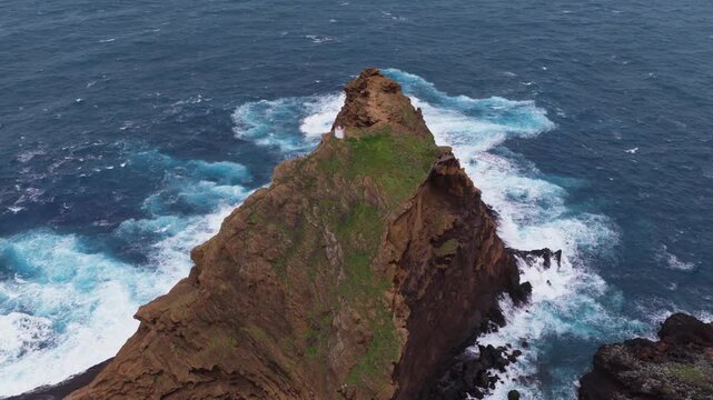 Dramatic Rocky Cliff with Waves Crashing Madeira Portugal Aerial View
