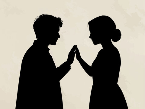 Silhouette of a couple in love, reaching out to each other, warm background