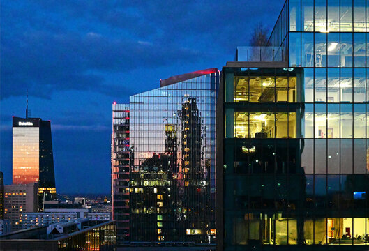 Warsaw, Poland, Europe - 04.2026 : from left: Q22 Tower - headquarters of Deloitte Poland, mBANK Tower - mBANK Headquarters, foreground right - STUDIO - office skyscraper finishing interior works