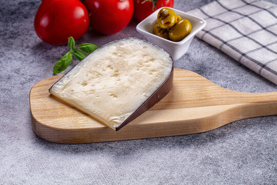 French Gruyere cheese over board