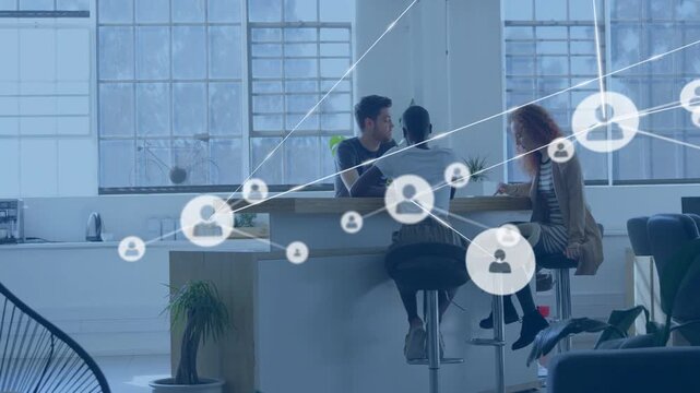 Three pros discussing at bar, tech network emerging from right, overtaking frame showing team links
