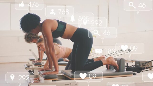 Lead Pilates woman on reformer doing kneeling plank while peers mirroring as likes appearing above
