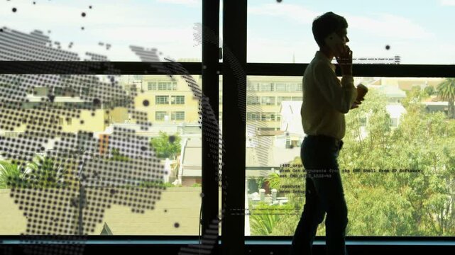 Woman putting phone to ear, pacing by window, globe decal and data dots supporting business call