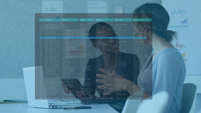 Two women reviewing tablet and laptop at table gesturing and causing overlay with blue band moving