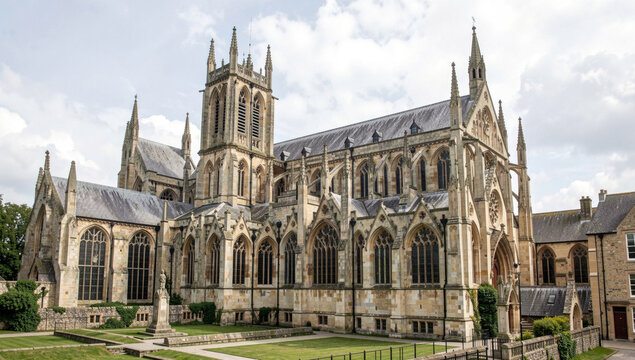 A large building with a clock tower at its peak, suitable for urban or historical scenes