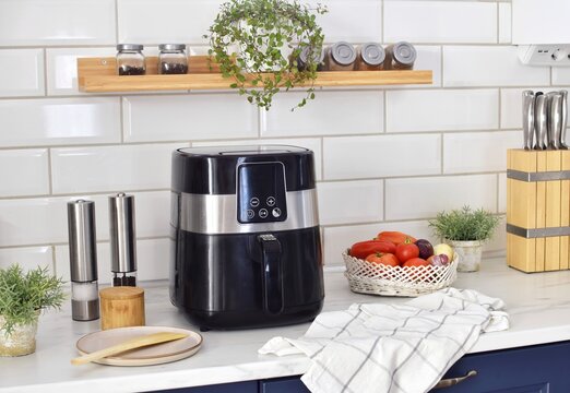 Cooking in an air fryer. Healthy eating.