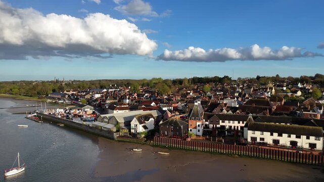 Aerial shot of Manningtree, a civil parish in Essex, UK, on the River Stour at low tide