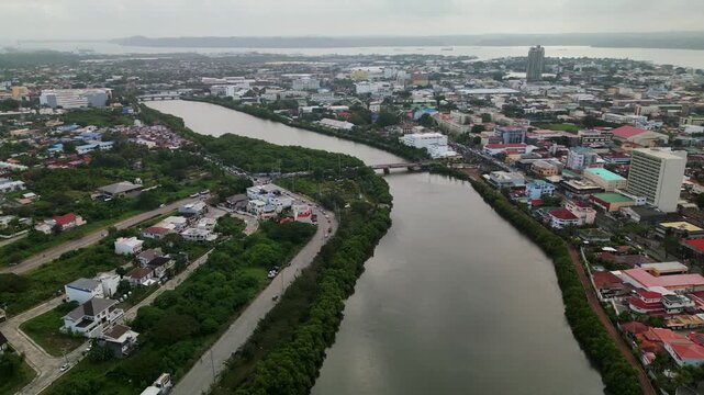 Flyover Iloilo River Waterways Meandering Through The City In Iloilo, Philippines. Aerial Drone Shot