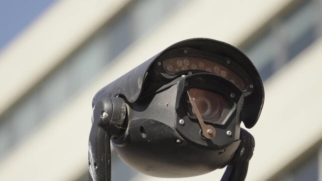 High-Tech Outdoor Surveillance Camera. Represents government oversight, public safety, and modern urban security systems. Visual metaphor for state surveillance, privacy concerns, and monitoring.