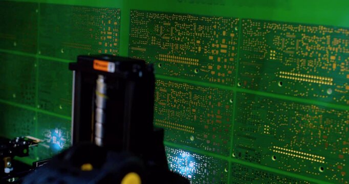  Modern hi-tech production. Electronic circuit boards production and installation of SMD components. Special equipment diagnose and test chips and processors. Manufacture of electronic chips. Close-up